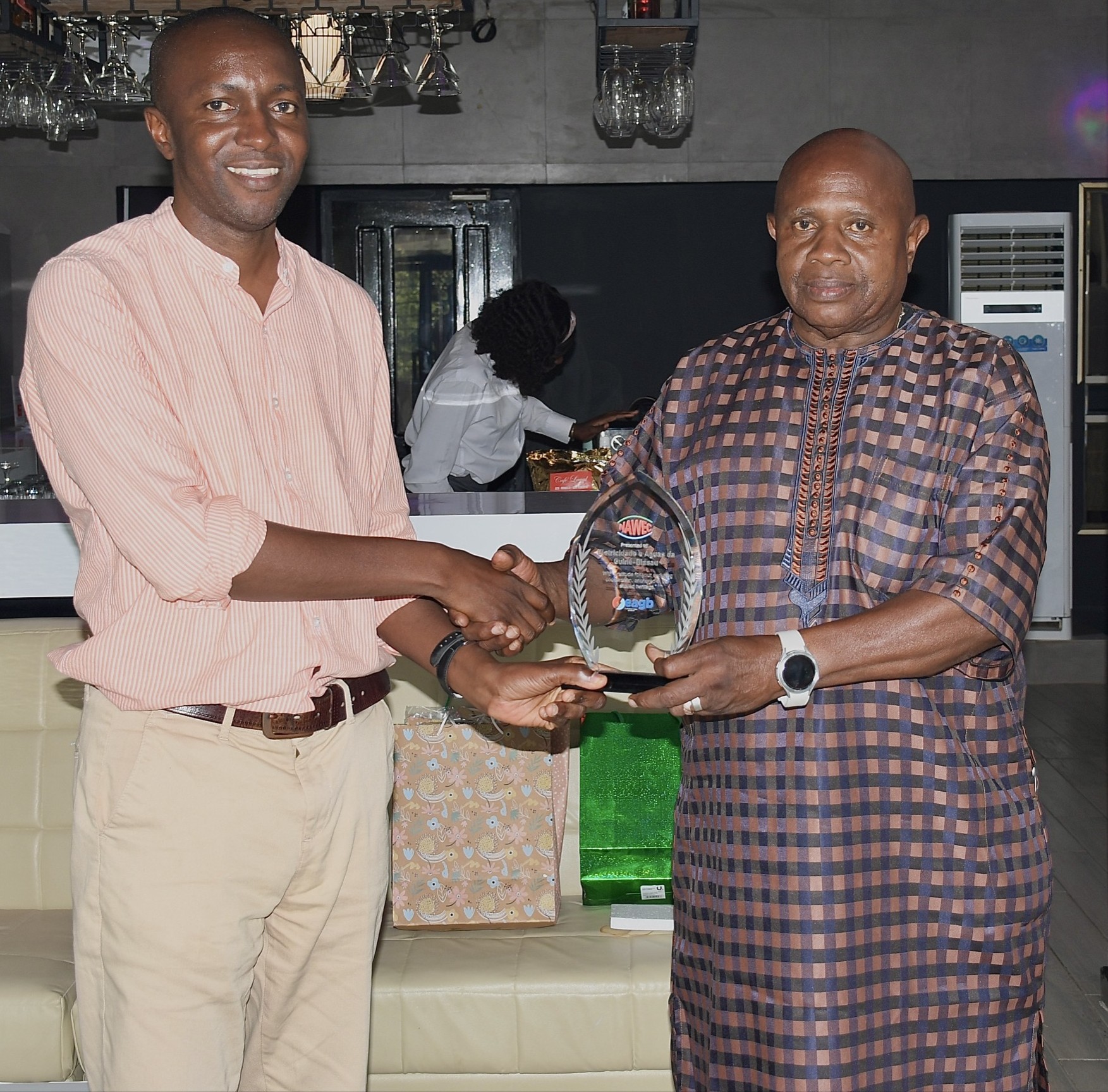 NAWEC officials presenting official gifts to the EAGB delegation