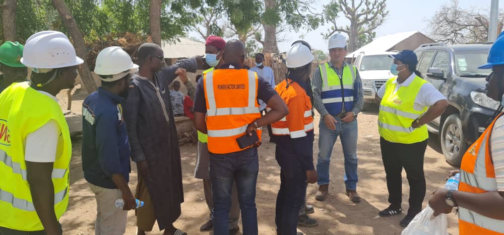 NAWEC PIU officials discussing and inspecting site works during monitoring mission