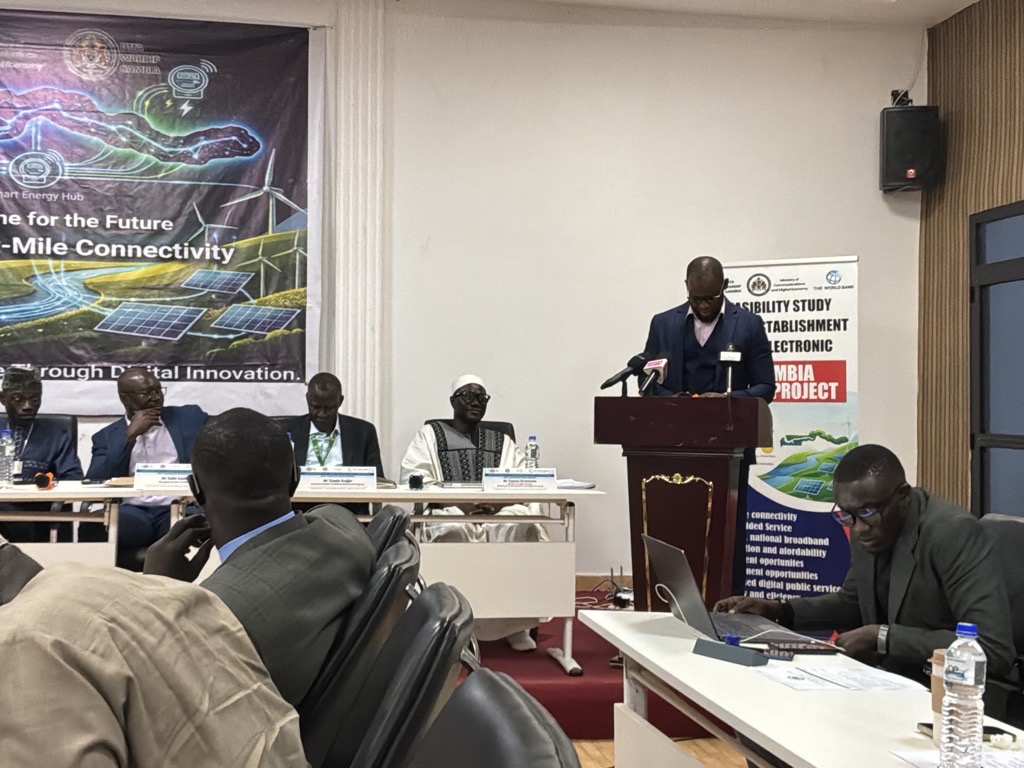 Participants delivering remarks at the e-Gambia Power Project Stakeholder Validation Workshop